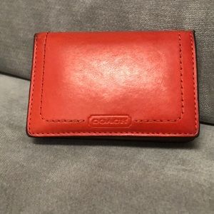 Coach orange and navy bifold wallet